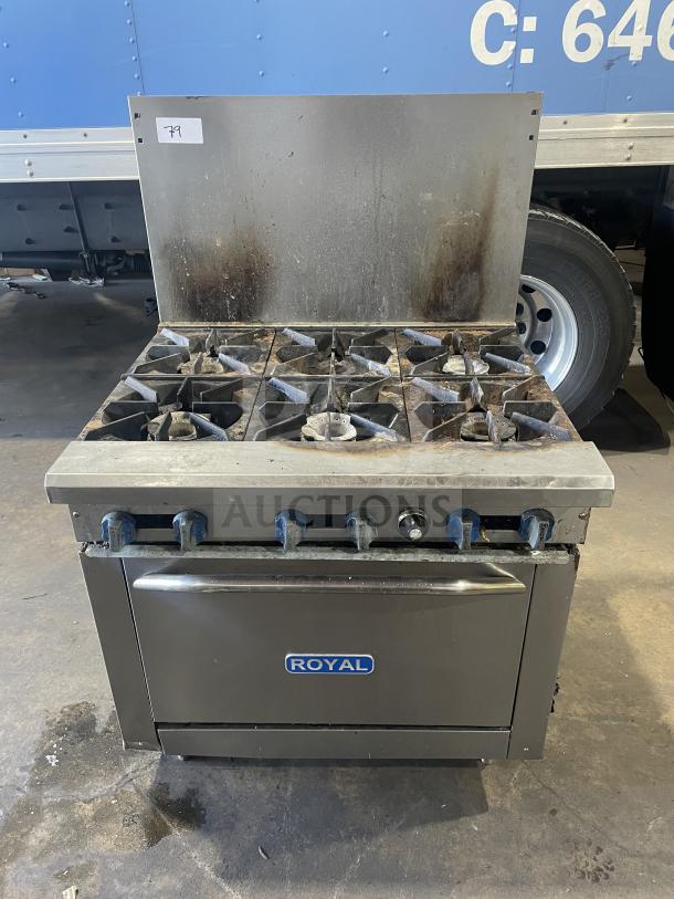 Royal commercial stainless steel 6-burner natural gas range/oven with backsplash and overhead salamander shelf, includes wired oven rack, on legs.