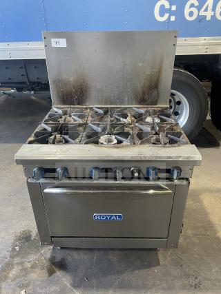 Royal commercial stainless steel 6-burner natural gas range/oven with backsplash and overhead salamander shelf, includes wired oven rack, on legs.