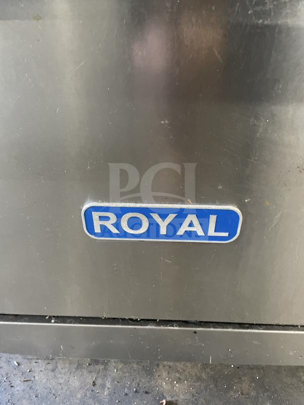 Royal commercial stainless steel 6-burner range/oven combo with backsplash, overhead salamander shelf, and wired oven rack.