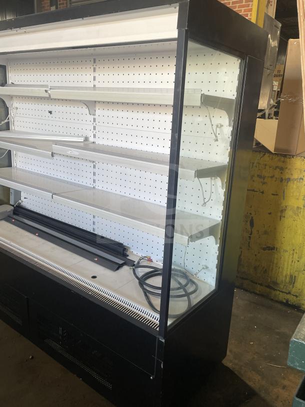 Sanye black multi-tier refrigerated open merchandiser display case in good condition; shelves and electrical cords visible.