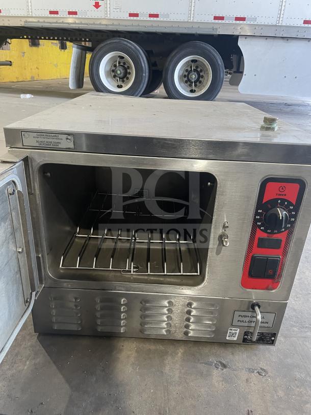 Vulcan C24EA3 stainless steel 3-pan countertop convection steamer, electric powered, built-in pan rack, good condition.
