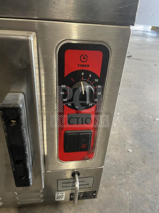 Vulcan C24EA3 stainless steel electric countertop 3-pan convection steamer with timer and pan rack, excellent condition.