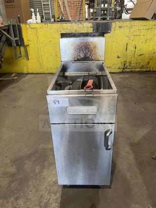 Royal commercial stainless steel natural gas floor fryer with backsplash, 1 basket, on casters; used condition.