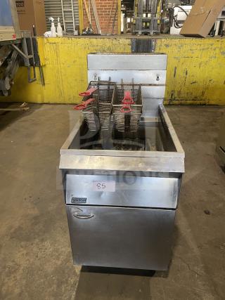 Pitco Frialator commercial stainless steel deep fryer, natural gas, with backsplash, basket hanger, fry basket, on legs.