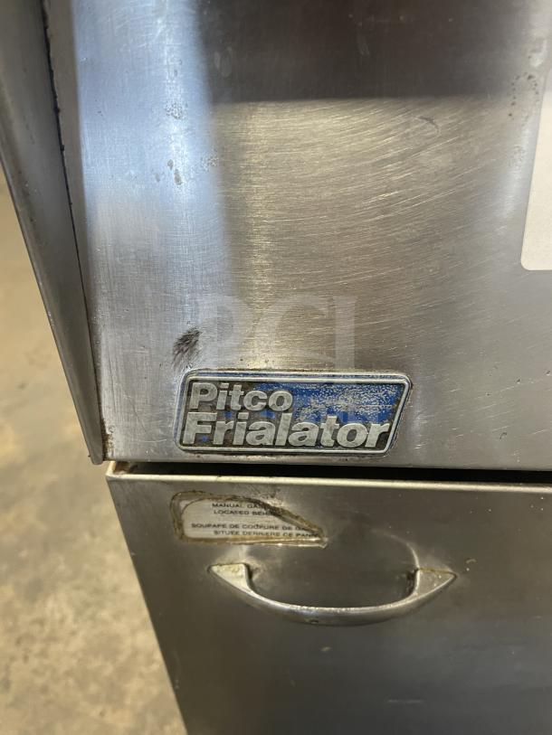 Pitco Frialator commercial stainless steel deep fat fryer, natural gas, with backsplash, basket hanger, and fry basket.