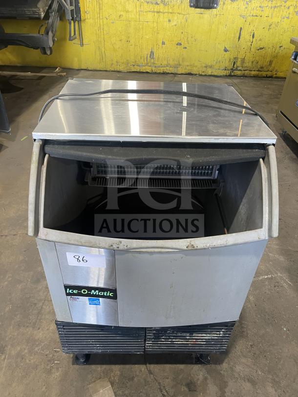 Ice O-Matic ICEU220HA3 commercial ice maker, on legs, 115V, 1 phase, visible brand label, stainless steel exterior.