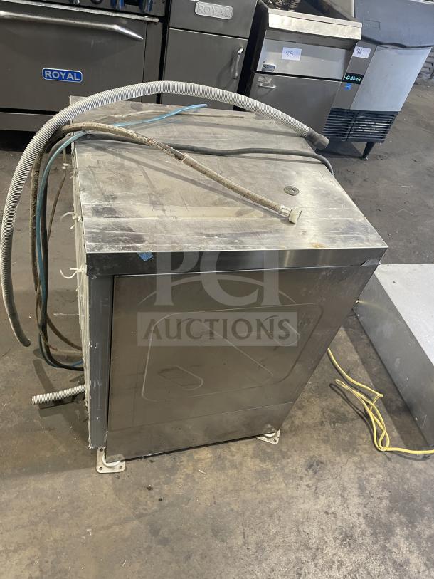 Comenda Commercial Series stainless steel undercounter dishwasher, SN: GS0018690315, visible hoses, used condition.