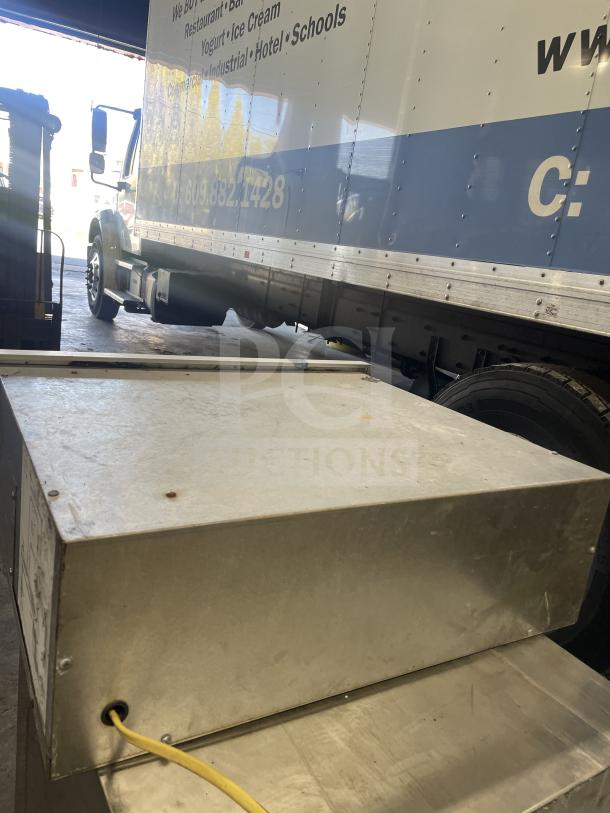 Viking stainless steel commercial warming drawer, electric-powered, shown in used condition. Features include durable build and power cord.