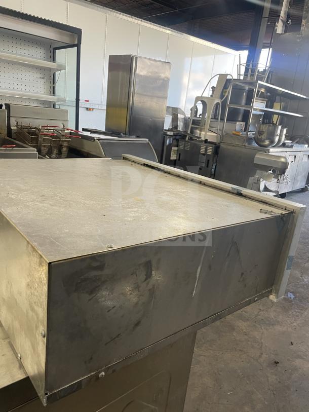 Viking stainless steel commercial electric warming drawer in good condition, features durable design and spacious interior.