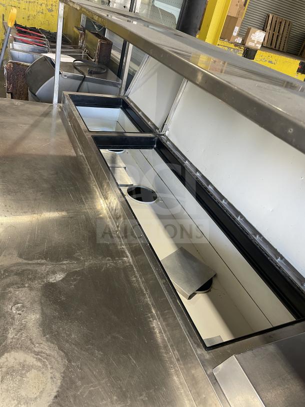 True TTP-93 3-Door Refrigerated Pizza Prep Table, stainless steel, on casters, visible compartments, power: 115V, 1 phase.