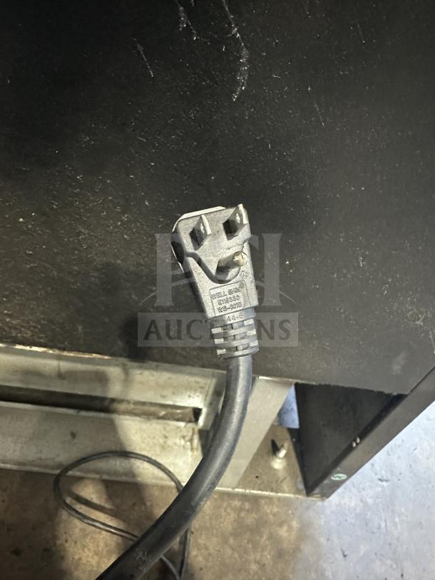 Universal Nolin Commercial Beverage Cooler MC1100S-1-SU-64 with 2 sliding glass doors, 120V plug shown.