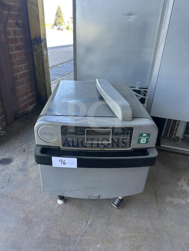 TurboChef commercial electric countertop rapid cook oven, model ENC2, with digital controls, on legs, 208/240V, 1 phase.