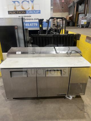 True stainless steel 2-drawer refrigerated chef base, model 1RE-PT-HD. Features oversized worktop, on casters, SN: 15051799.