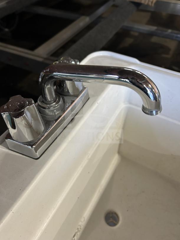 Good! Mustee Liltub commercial single laundry tub with 2-handle faucet, shown on legs, in good condition.