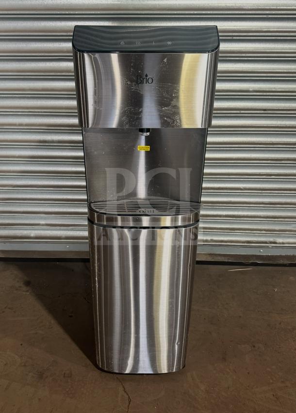 Brio CLBL720SC electric water dispenser, stainless steel, 115V. Features caution label, good condition. SN: 2207010250.