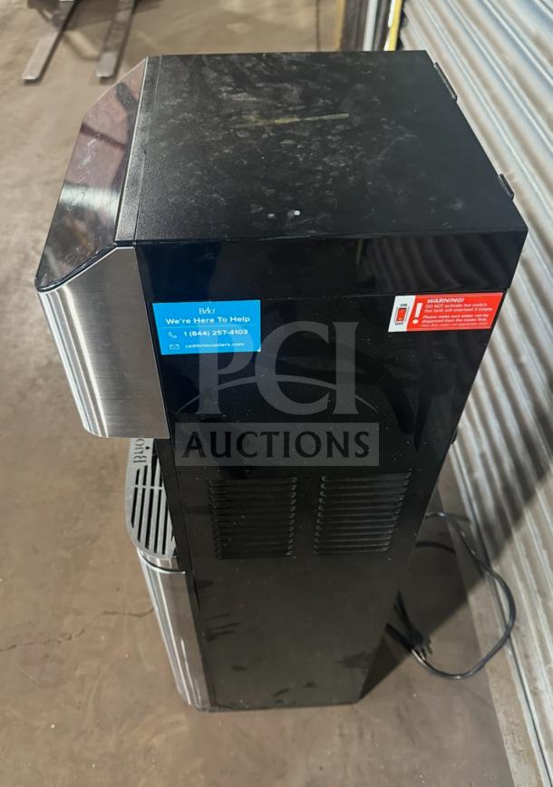 Brio electric water dispenser, Model CLBL720SC, black with stainless accents. Features warning and help labels.