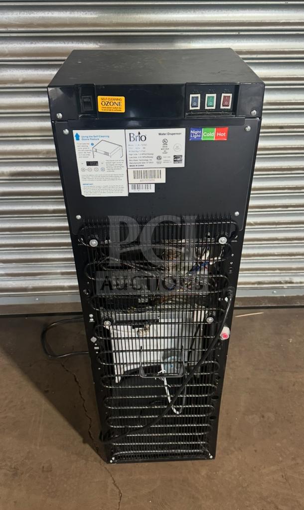 Brio electric water dispenser, model CLBL720SC, with self-cleaning feature and visible power controls. Serial number 2207010250.