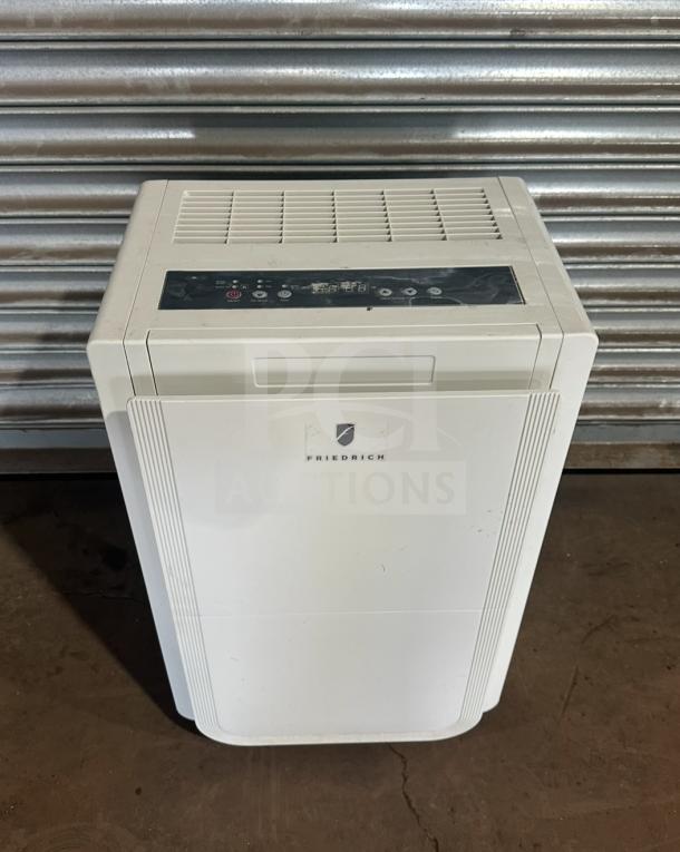 Friedrich D50BP dehumidifier on casters, white, digital controls, model D50BP, SN: AFAD00983, 115V, good condition.