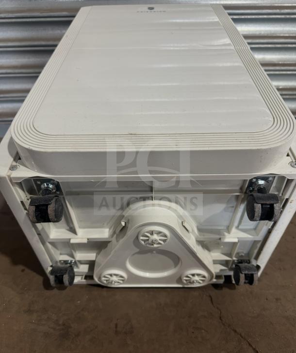 Friedrich dehumidifier model D50BP on casters, 115V, SN: AFAD00983. White exterior, excellent condition.