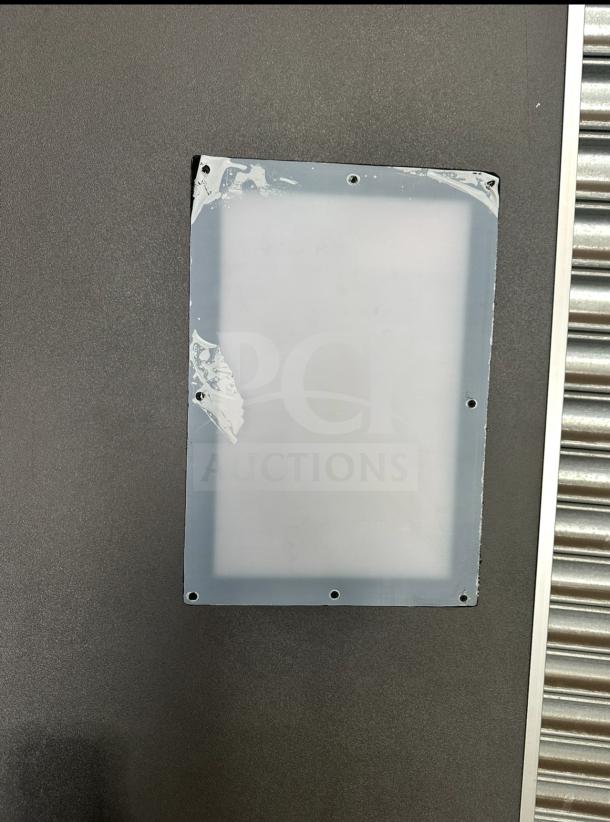 Impacdor refrigerator door panel, silver, minor edge wear, serial number 830160 visible. Suitable for repair or replacement.