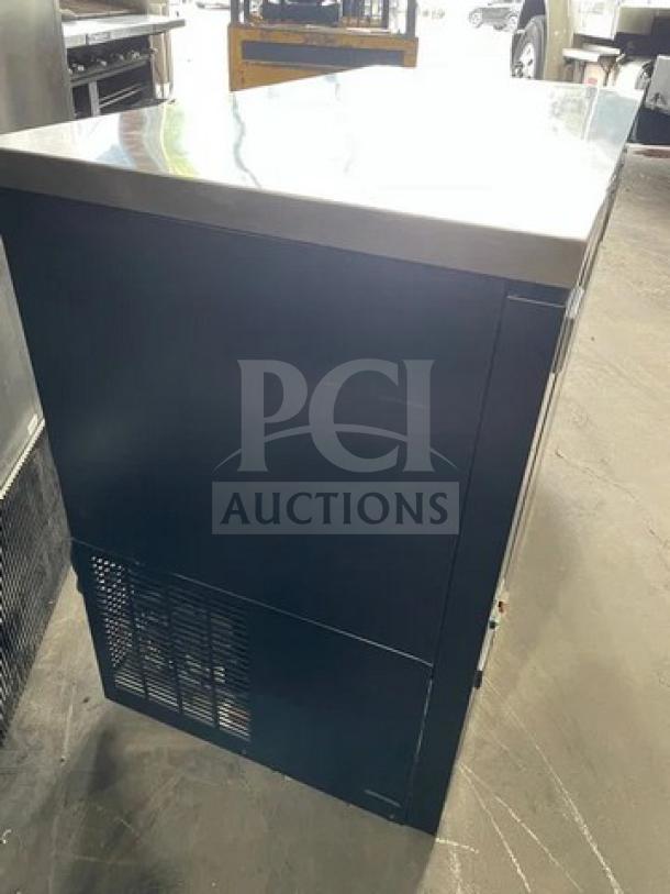 Kelvinator Commercial Black 2 Door 48" Back Bar Refrigerator with stainless steel worktop, model KCBB48SBHC, excellent condition.