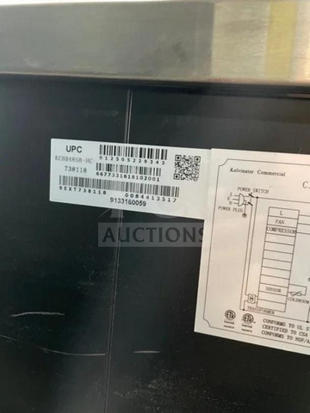 Kelvinator KCBB48SBHC commercial black 2-door back bar refrigerator with stainless steel worktop and poly-coated wire racks.