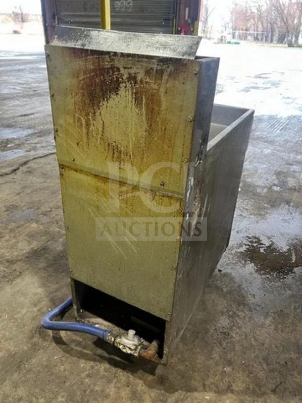 Asber Model AEF40/50 stainless steel natural gas fryer with back splash, on casters, showing signs of wear.