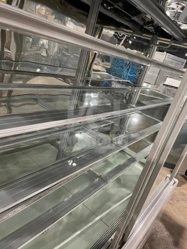 Commercial white multi-tier refrigerated bakery display showcase with double glass sliding doors, Model ZSG-LLQ18, 220V.