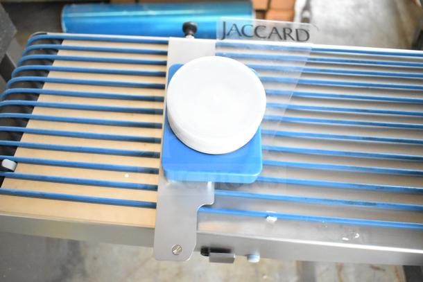 Jaccard Conveyor Commercial Meat Slicer Stacker, floor style, 115V, 1 Phase, metal and blue plastic components, "Jaccard" label visible.