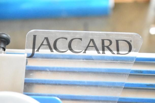 Jaccard Conveyor Commercial Meat Slicer Stacker, 115V, 1 Phase, features brand logo on panel, blue components visible.