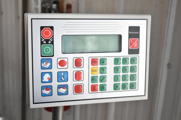 Jaccard Conveyor Commercial Meat Slicer control panel, featuring buttons and a display screen. In good condition.