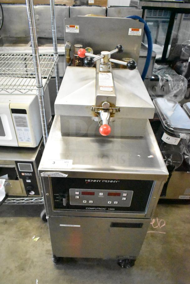 2023 Henny Penny 600 gas pressure fryer on casters, 80,000 BTU, clean stainless steel, visible control panel and safety labels.