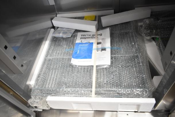 Brand new Avantco 178SS3FHC 3-door freezer, packaged with bubble wrap and foam. Includes paperless setup guide.