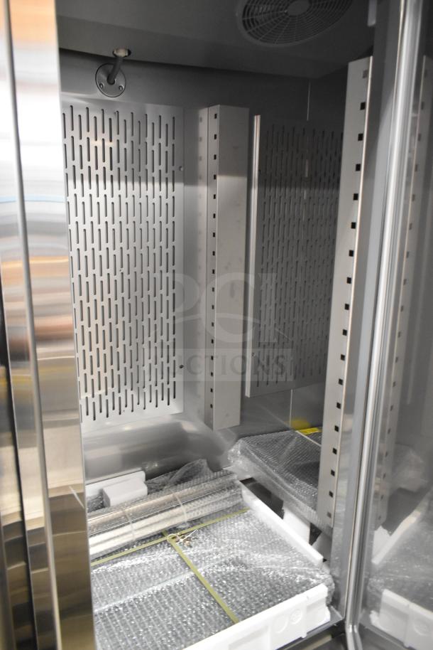 Brand new 2025 Avantco 178SS3FHC 3-door commercial freezer interior. Scratch and dent condition, 115 volts, 1 phase.