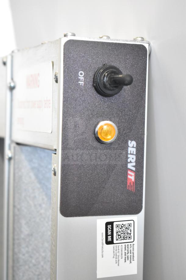 BRAND NEW ServIt 423SW60TLCPA 60" lighted strip warmer, single toggle control, labeled "OFF," QR code for product info.