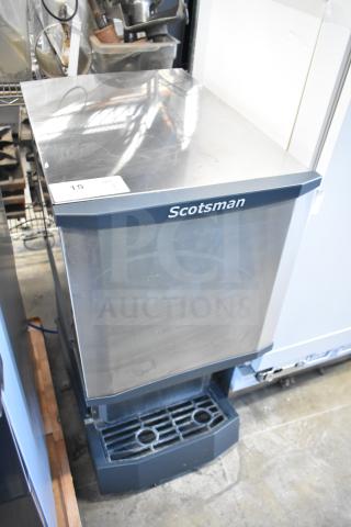 Brand new, scratch and dent Scotsman HID312A-1A ice machine and water dispenser. Countertop, 12 lb. bin, hands-free.
