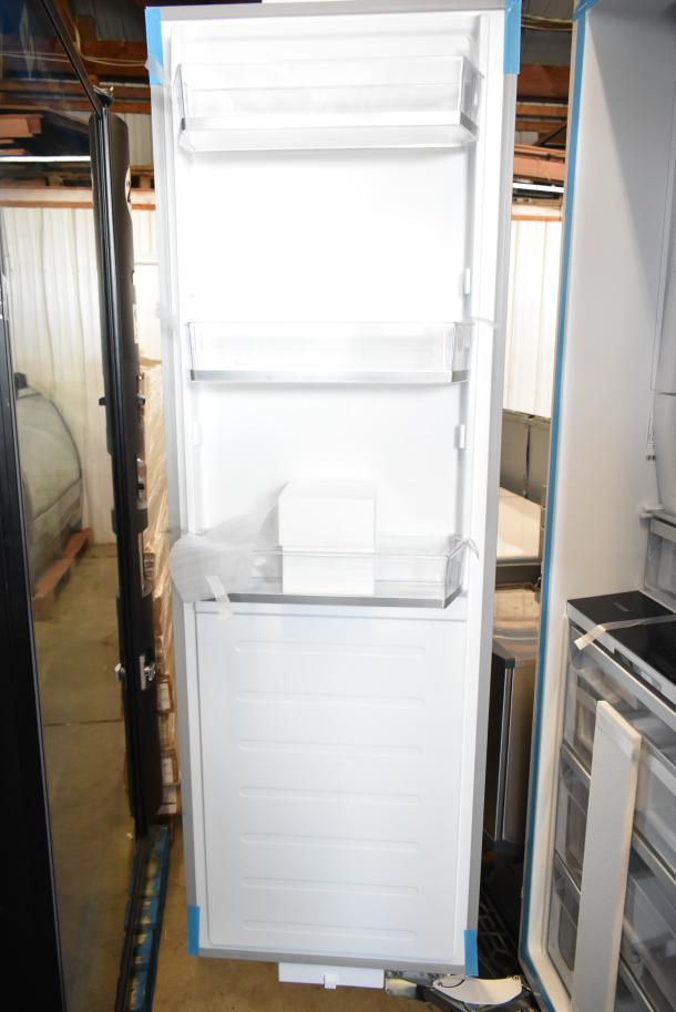 New single door reach-in cooler with minor scratches, 115 volts, 1 phase, interior shelves visible, auction item.