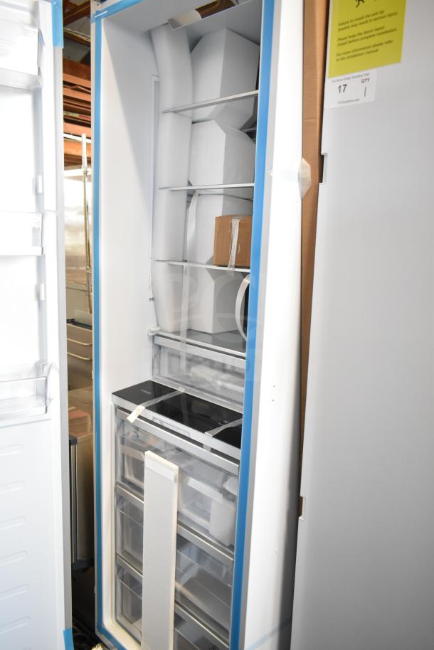 Brand new single door reach-in cooler with visible scratch and dent. 115 volts, 1 phase. Shelving and labels intact.