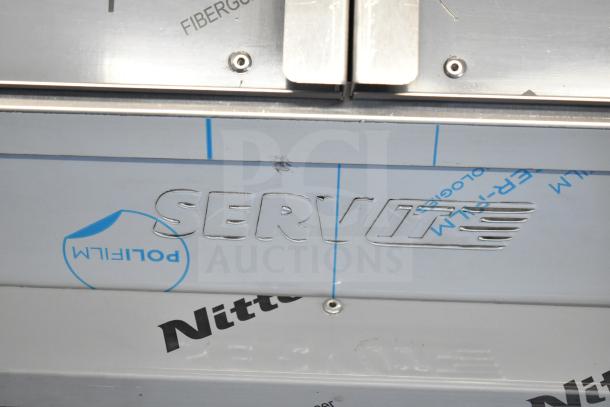 Brand new ServIt 423TCW26 chip warmer, 26-gallon capacity. Small scratches visible. 120V, 1 phase. Labels: ServIt, Polifilm, Nitto.