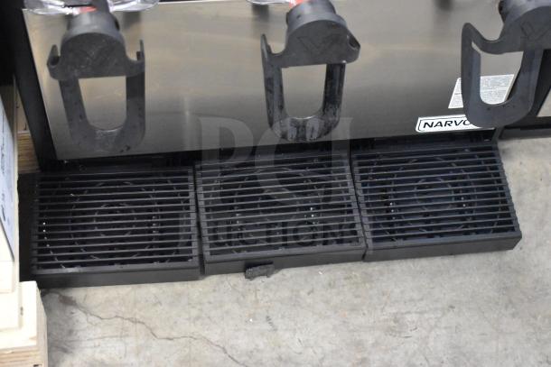BRAND NEW SCRATCH AND DENT! Narvon 378RBD5G3 Triple 5 Gallon Bowl Refrigerated Beverage Dispenser with three black drip trays and Narvon branding.