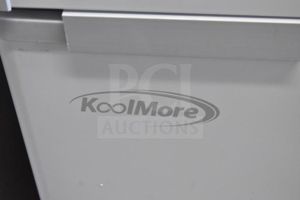 Brand new KoolMore SCF-24C 77-inch commercial chest freezer, 24 cu ft, 115V, with slight scratches and dents.