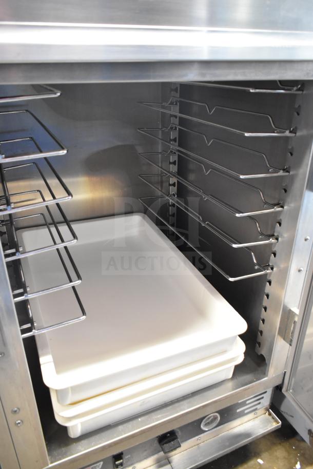 2023 ServIt 423CC1UFISD commercial insulated holding cabinet with solid Dutch doors, stainless steel, excellent condition.