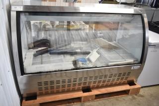 Brand new Avantco 178DLC64HCS 64" stainless steel curved glass refrigerated deli case with minor scratches and dents. 115 volts, 1 phase.