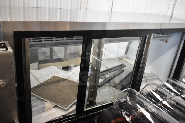 "Avantco 178DLC64HCS 64-inch stainless steel curved glass refrigerated deli case, brand new, minor scratches, 115V, 1 phase."