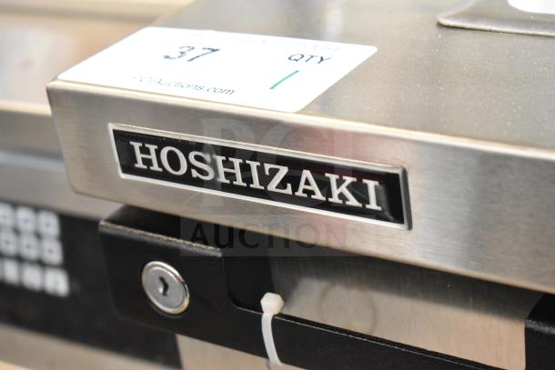 2019 Hoshizaki DD24 S Commercial Kegerator, 115V, 1 Phase. Stainless steel with Hoshizaki logo and auction tag visible.