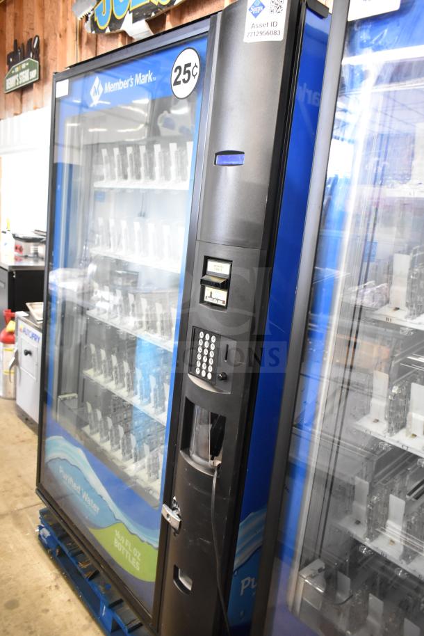Crane 5800-4 commercial vending machine with bill acceptor, 115 volts, 1 phase. Features bottle display and keypad.