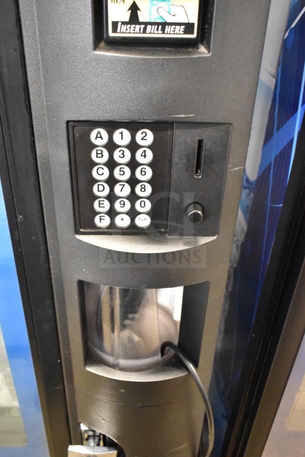 Crane 5800-4 vending machine with keypad and bill acceptor. 115 volts, 1 phase. Commercial bottled drink dispenser.