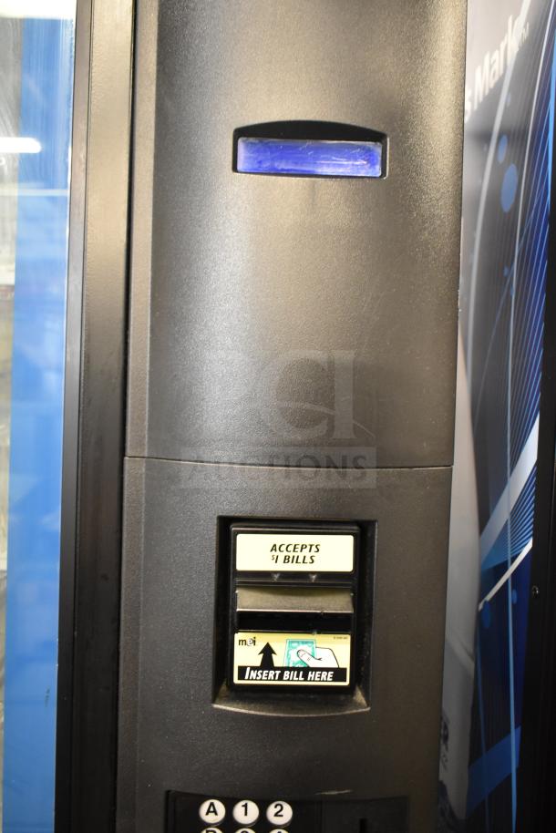 Crane 5800-4 commercial vending machine with bill acceptor, accepts $1 bills, 115 volts, 1 phase, in good condition.