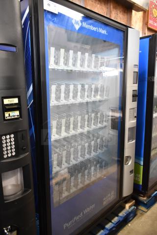 Crane 5800-4 commercial drink vending machine with bill acceptor, 115 volts. Features multiple shelves and keypad.