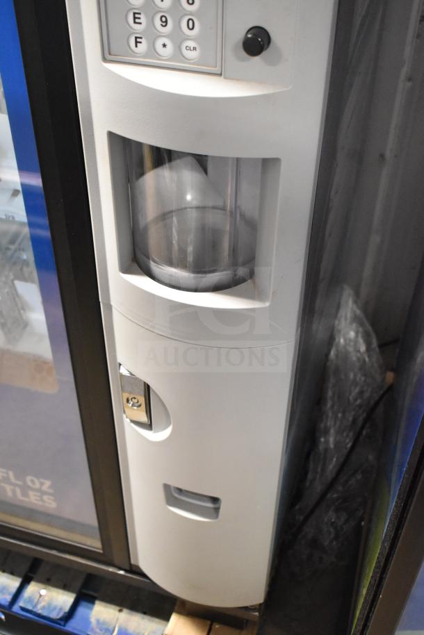 Crane 5800-4 commercial drink vending machine with bill acceptor, keypad, and bottle display. 115 volts, 1 phase.